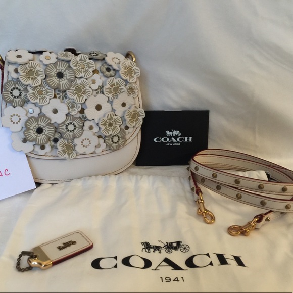 coach tea rose saddle bolsa